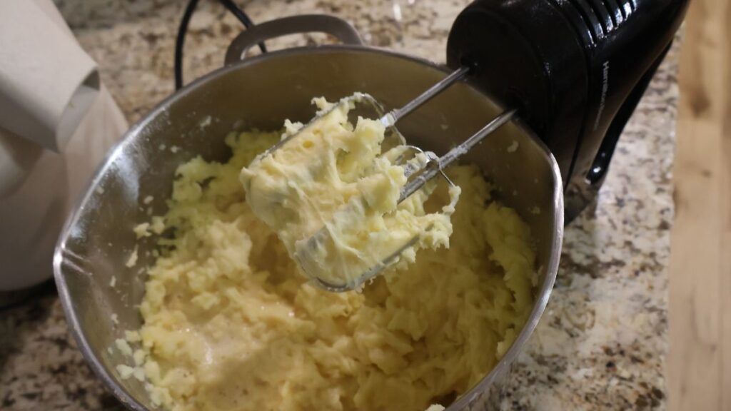 hand mixer in whipped potatoes