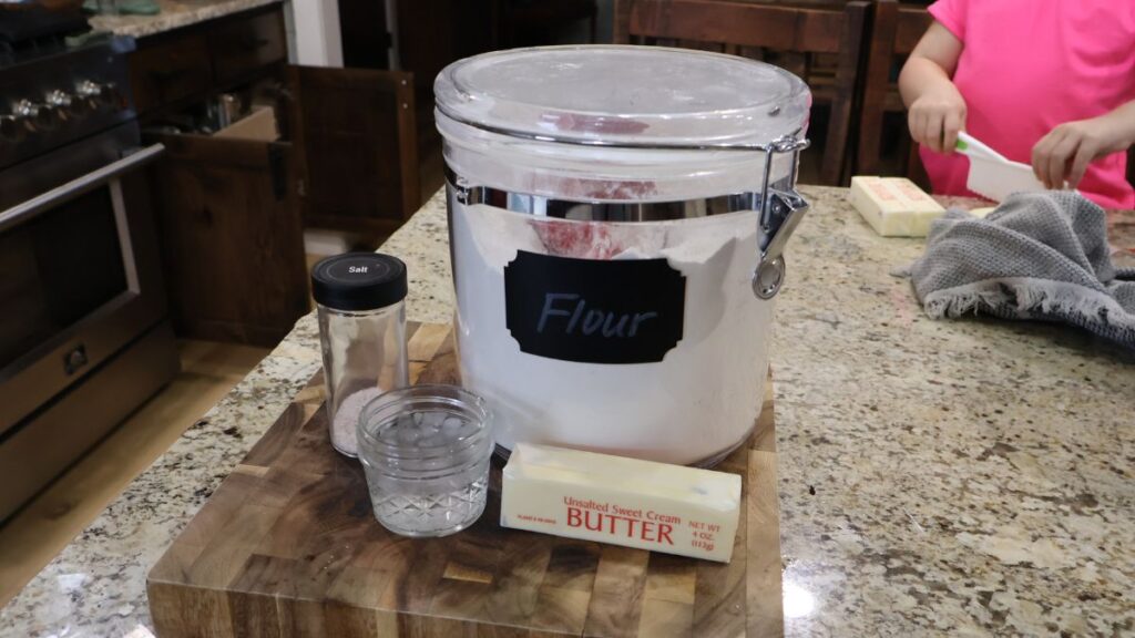 stand mixer pie crust recipe ingredients displayed on cutting board