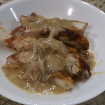 turkey gravy poured over turkey breast pieces