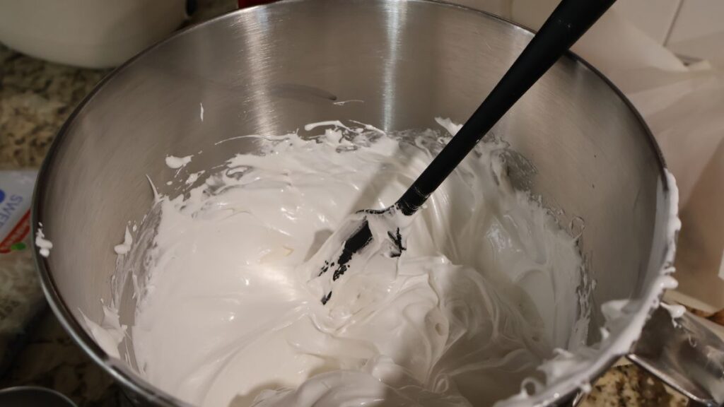 marshmallow meringue in mixing bowl