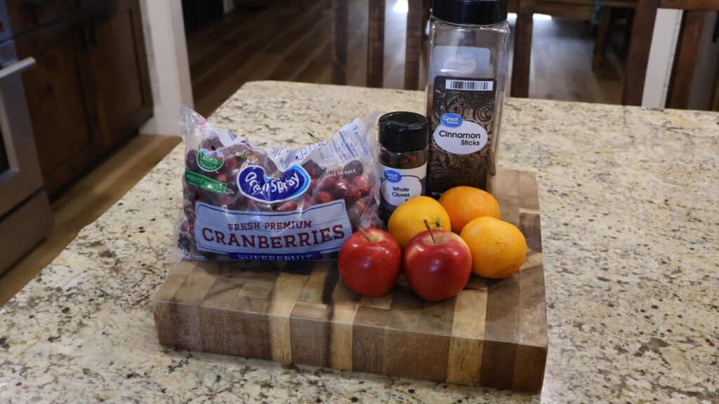 simmer pot ingredients displayed on cutting board