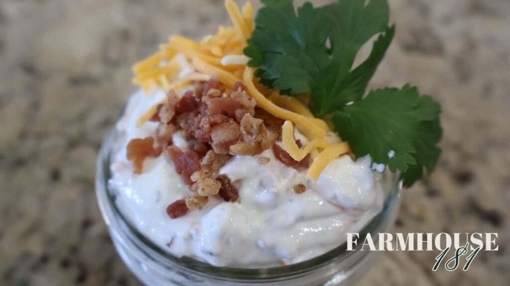 bacon cheddar ranch dip in mason jar with garnish zoomed in photo