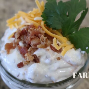 bacon cheddar ranch dip in mason jar with garnish zoomed in photo