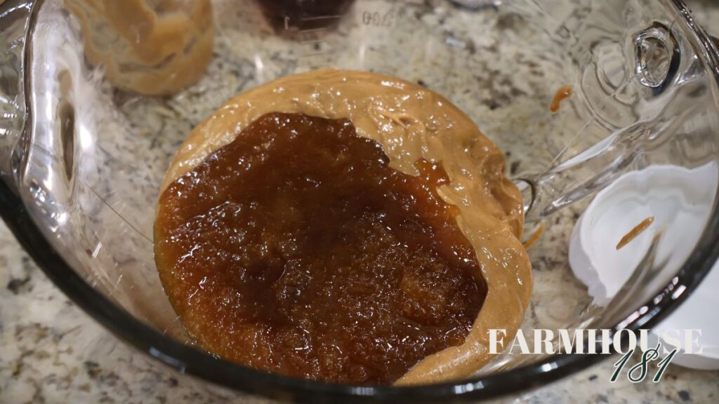 peanut butter and honey in glass mixing bowl