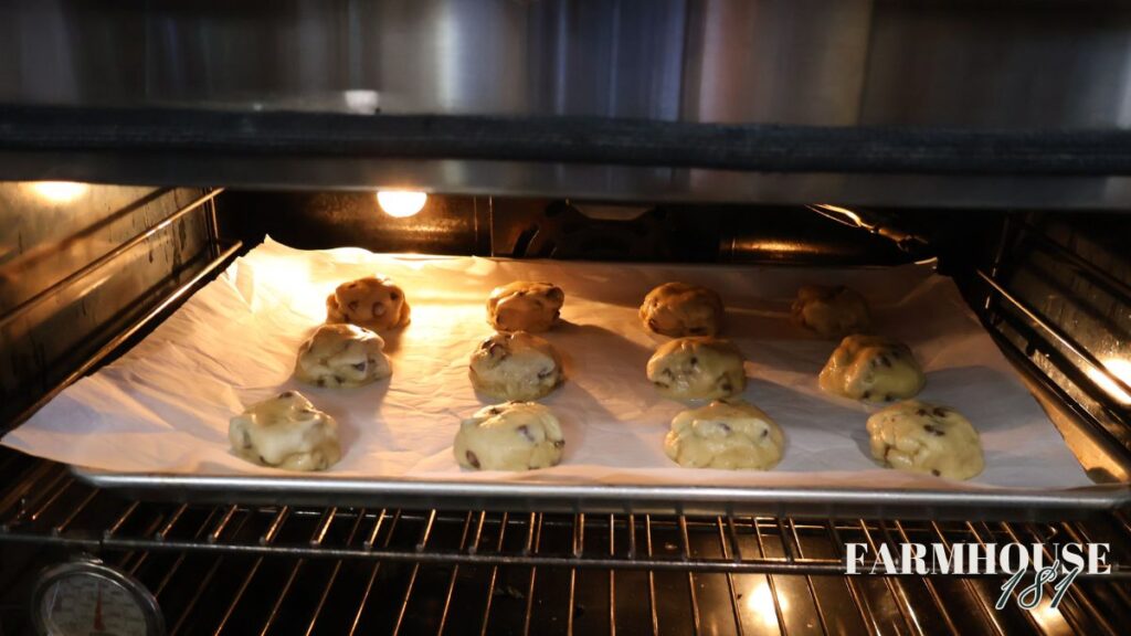 chocolate chip cookies baking in oven