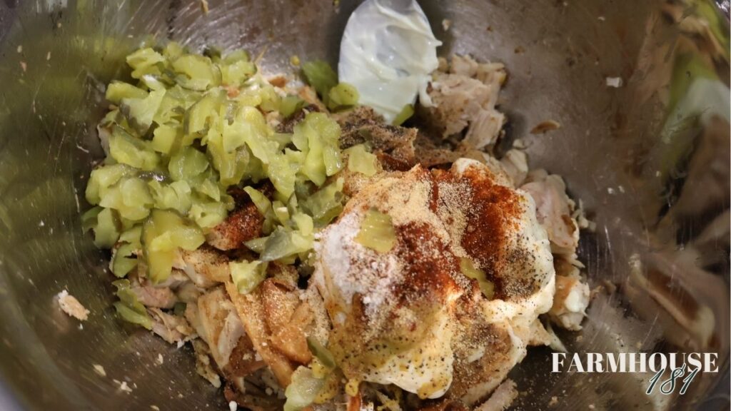roasted chicken salad ingredients in bowl not yet mixed together